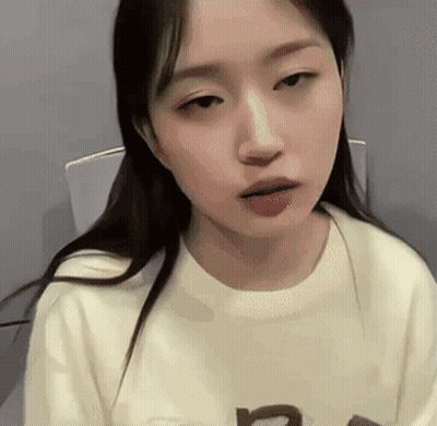 Close Up Of Woman In White Shirt GIF