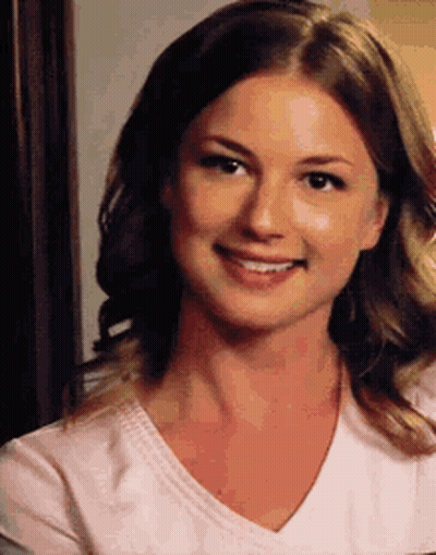 Close-Up Of Woman In White Shirt Smiling GIF
