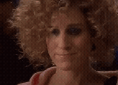 Close Up Of Woman's Curly Blonde Hair GIF
