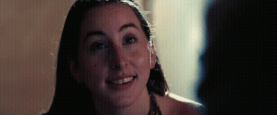 Close Up Of Woman's Face In Dark Room GIF