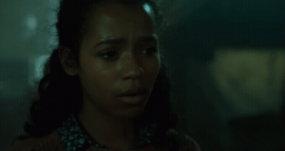 Close Up Of Woman's Face In Darkness GIF