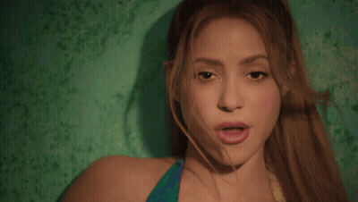 Close Up Of Woman's Face On Green Background GIF