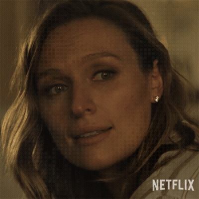 Close Up Of Woman's Face Saying Netflix GIF