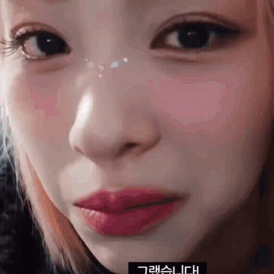 Close Up Of Woman's Face With Chinese Writing GIF