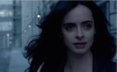 Close Up Of Woman's Face With Dark Hair GIF
