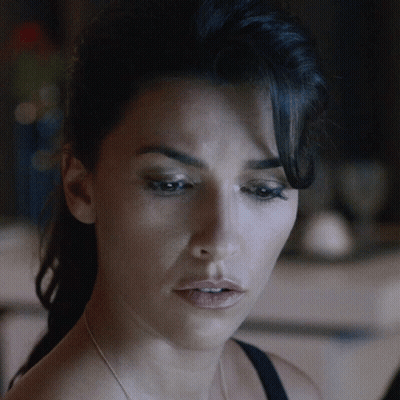 Close Up Of Woman's Face With Dark Hair GIF