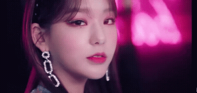 Close Up Of Woman's Face With Earrings GIF