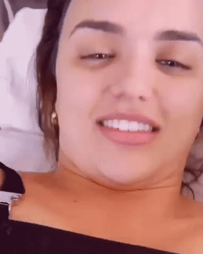 Close Up Of Woman's Face With Eyes Closed Smiling GIF