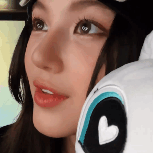 Close Up Of Woman's Face With Heart On Eye GIF