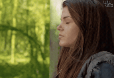 Close Up Of Woman's Face With Lulu Girls GIF
