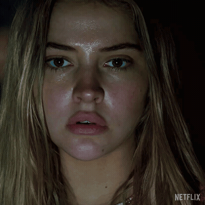 Close Up Of Woman's Face With Netflix Logo GIF