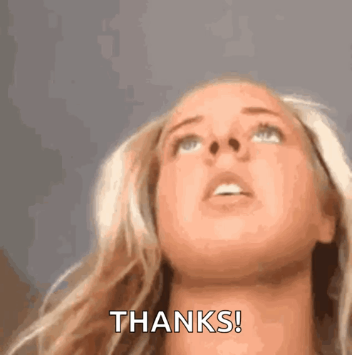 Close Up Of Woman's Face With Thanks Written On It GIF