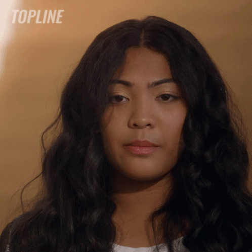 Close Up Of Woman's Face With Word Topline GIF