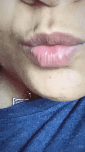 Close Up of Woman's Mouth With Pink Lips