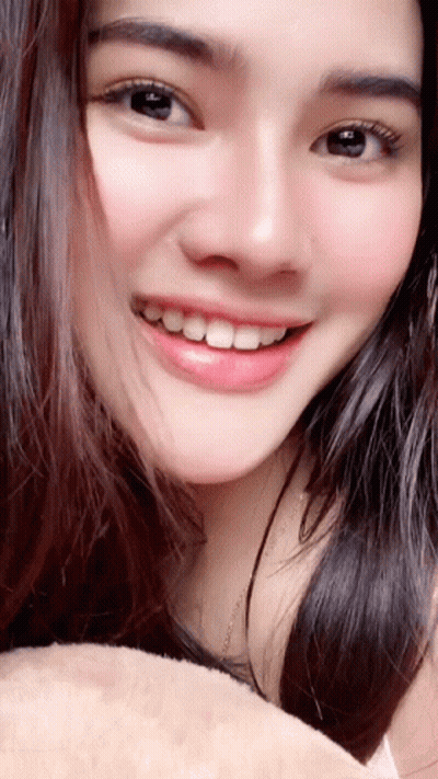 Close Up Of Woman Showing Teeth GIF