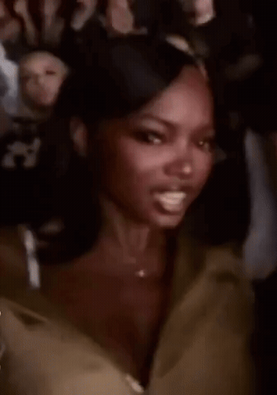 Close Up Of Woman Sitting In Chair GIF