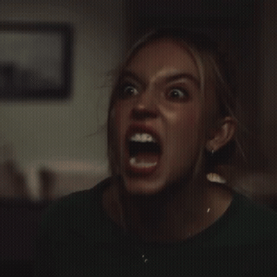 Close Up Of Woman Surprised Face GIF
