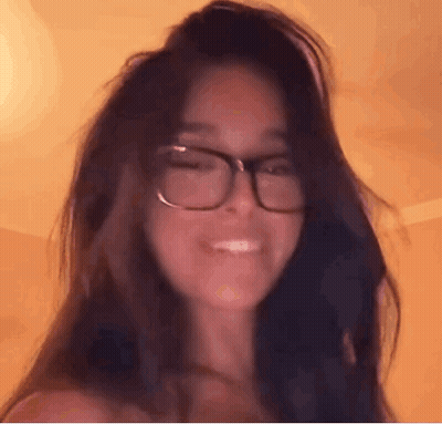 Close Up Of Woman Wearing Glasses GIF