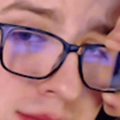 Close Up Of Woman Wearing Glasses GIF