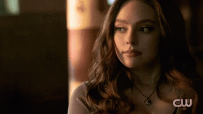 Close Up Of Woman Wearing Necklace GIF