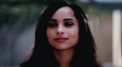 Close Up Of Woman With Black Eyes And Long Hair GIF
