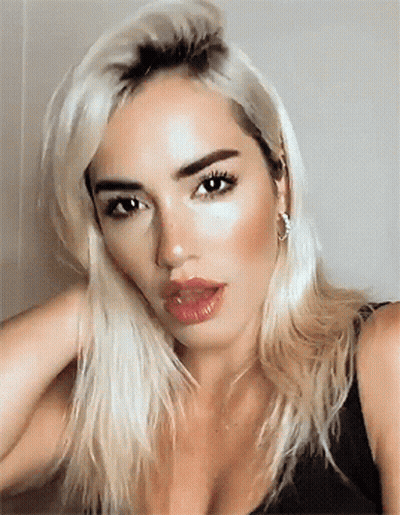 Close Up Of Woman With Blonde Hair GIF