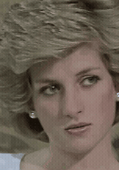 Close Up Of Woman With Blonde Hair And Blue Eyes GIF