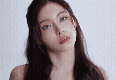 Close Up Of Woman With Blue Eyes GIF