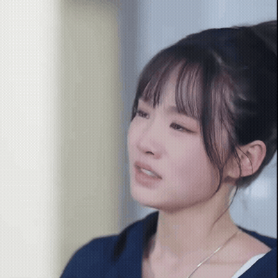 Close Up Of Woman With Bun On Head GIF