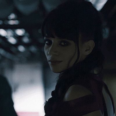 Close Up Of Woman With Dark Hair GIF