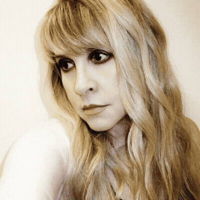 Close Up Of Woman With Long Blonde Hair And Bangs GIF