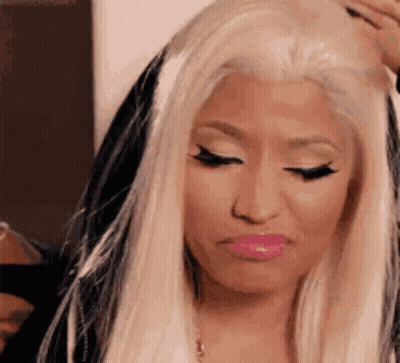 Close Up Of Woman With Long Blonde Hair And Pink Lips GIF