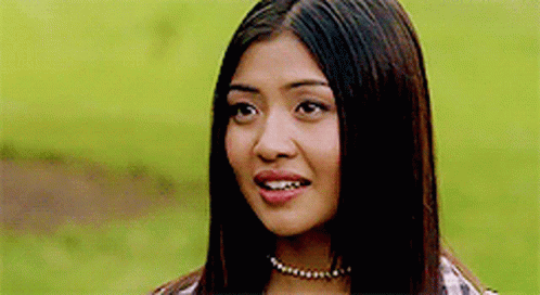 Close Up Of Woman With Long Hair And Necklace GIF