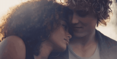 Close Up Of Woman With Man's Head On Shoulder GIF