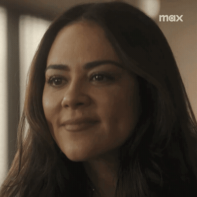 Close Up Of Woman With Max Logo GIF