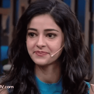 Close Up Of Woman With Microphone And Blue Shirt GIF