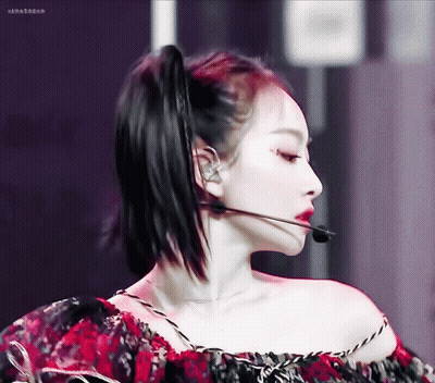 Close Up Of Woman With Microphone In Ear GIF