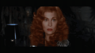 Close Up Of Woman With Red Hair And Red Lips GIF