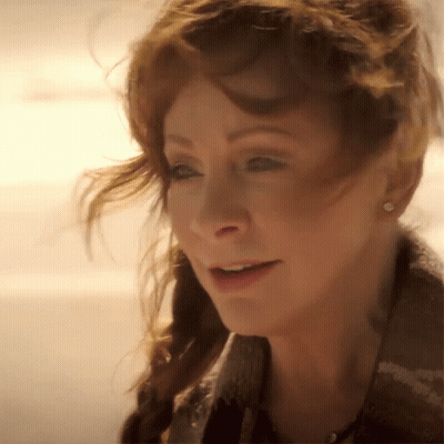Close Up Of Woman With Red Hair GIF