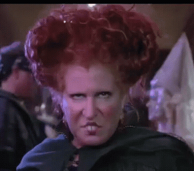 Close Up Of Woman With Red Hair Making Angry Face GIF