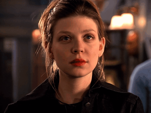 Close Up Of Woman With Red Lipstick And Earrings GIF