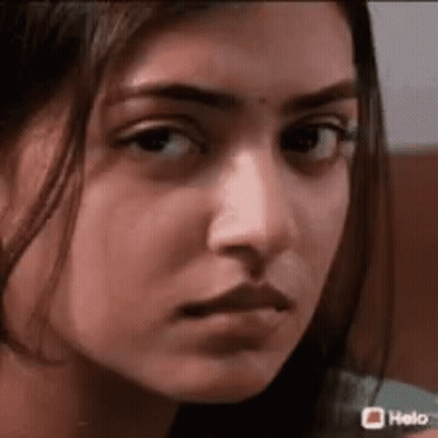 Close Up Of Woman With Serious Look GIF
