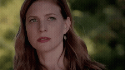 Close Up Of Woman With Serious Look GIF