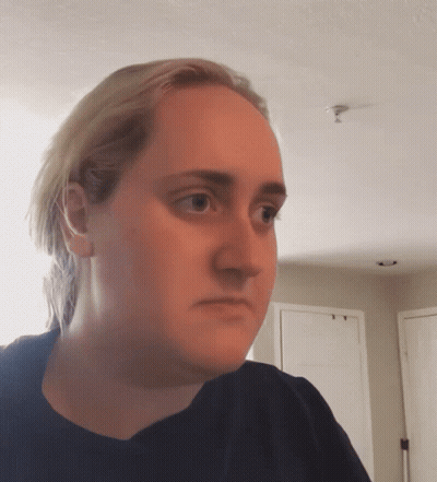 Close Up Of Woman With Serious Look GIF