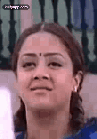 Close Up Of Woman With Serious Look GIF