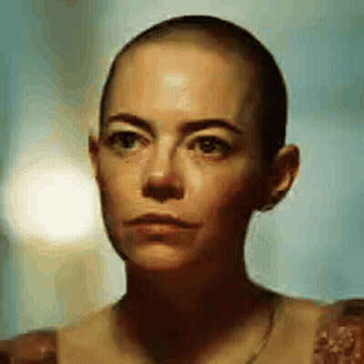 Close Up Of Woman With Shaved Head GIF