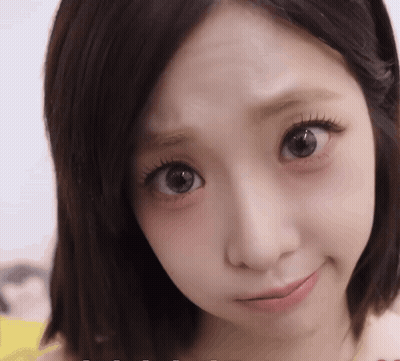 Close Up Of Woman With Slight Smile GIF