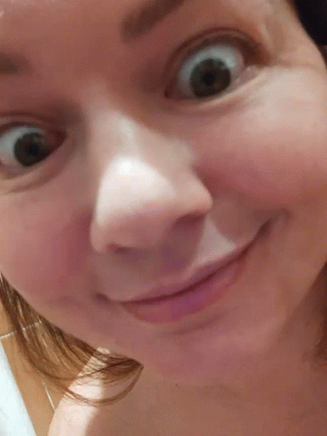 Close Up Of Woman With Slight Smile GIF