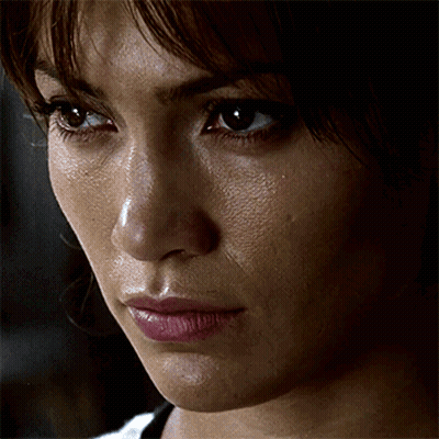 Close Up Of Woman With Tear Running Down Cheek GIF