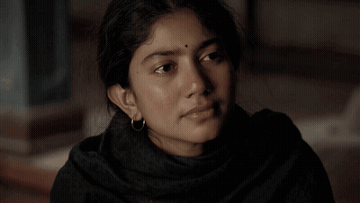 Close Up Of Woman With Tear Running Down Face GIF